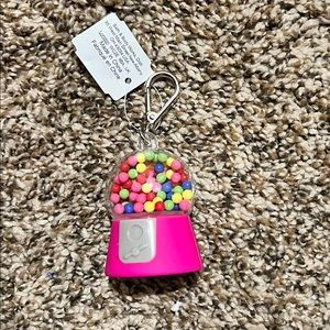 Gumball hand sanitizer holder